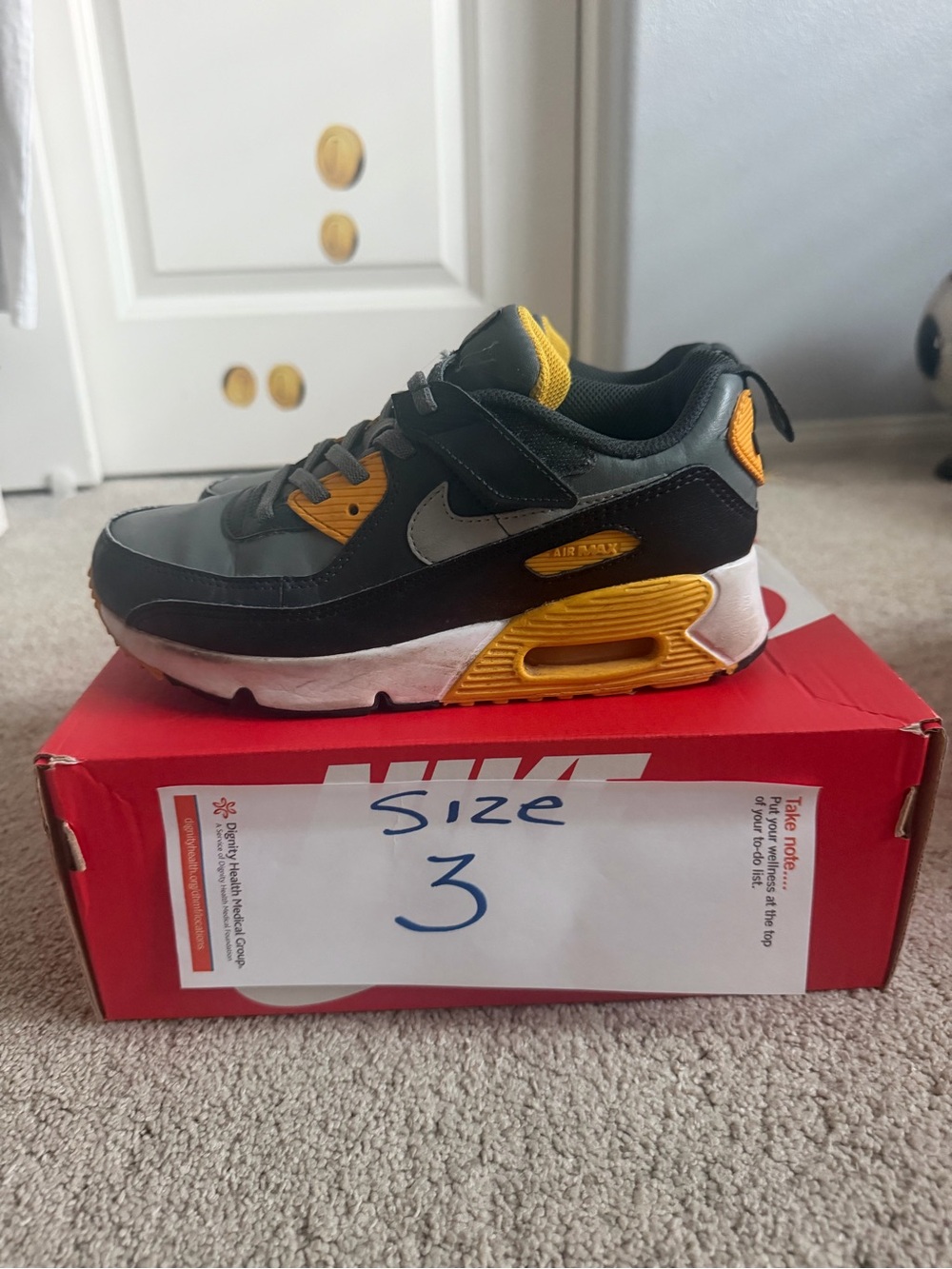 Nike Kids Black and Yellow Low-Top Sneaker
